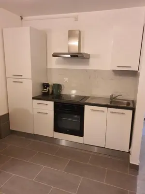 Cuisine ou kitchenette dans l'établissement CocooningSpace tout équipé + parking privé