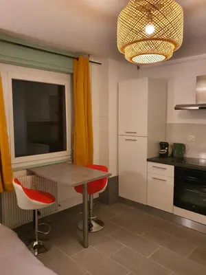 Cuisine ou kitchenette dans l'établissement CocooningSpace tout équipé + parking privé