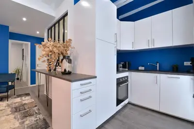 Cuisine ou kitchenette dans l'établissement Les suites du centre historique
