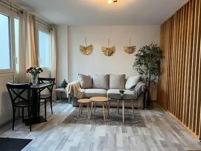 Coin salon dans l'établissement Gîte Les Lauriers