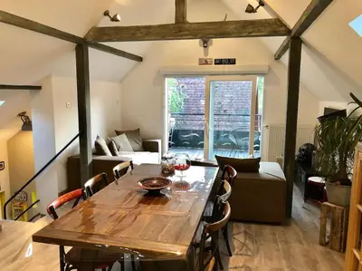 Coin salon dans l'établissement Le Logis du Vignoble