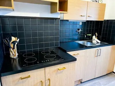 Cuisine ou kitchenette dans l'établissement Aux Toits d'Alsace