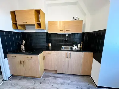 Cuisine ou kitchenette dans l'établissement Aux Toits d'Alsace