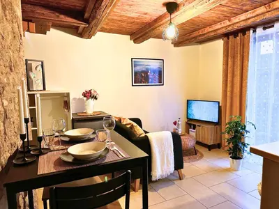 Télévision ou salle de divertissement dans l'établissement Le petit Châtaignier - Cozy Immo