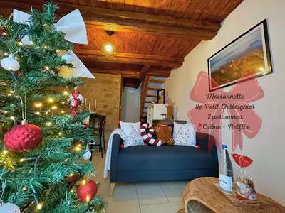 Coin salon dans l'établissement Le petit Châtaignier - Cozy Immo
