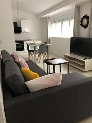 Télévision ou salle de divertissement dans l'établissement Alsacian Home - Old Town Cosy Apartments