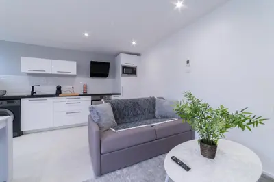 Cuisine ou kitchenette dans l'établissement LE ROYAL SWEET - PARKING GRATUIT + WIFI