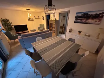 Télévision ou salle de divertissement dans l'établissement Appartement de Camargaux 70m2 secteur très calme
