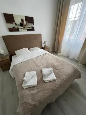 Un ou plusieurs lits dans un hébergement de l'établissement Esprit Forêt N0ire - appartement de luxe 3 chambres
