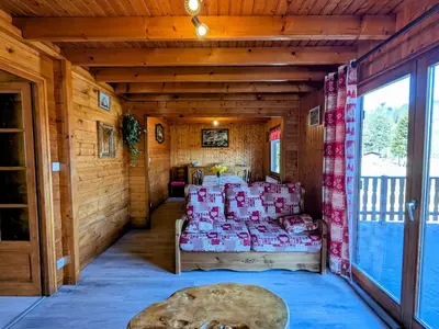 Coin salon dans l'établissement Chalet familial à La Bresse, proche randonnées, WIFI, animaux admis - FR-1-589-425