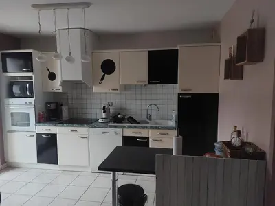 Cuisine ou kitchenette dans l'établissement Résidence PRIMAVERA. Les logis mansardés