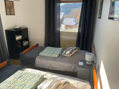 Un ou plusieurs lits dans un hébergement de l'établissement Entre Lac et Montagne 4/6 personnes
