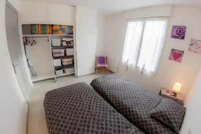 Un ou plusieurs lits dans un hébergement de l'établissement Cocooning chez Corinne , Gérardmer