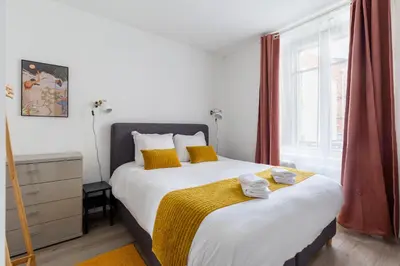 Un ou plusieurs lits dans un hébergement de l'établissement Travel Homes - Niffel 1 - Un havre de paix près du Parc