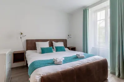 Un ou plusieurs lits dans un hébergement de l'établissement Travel Homes - Niffel 2 - Un havre de paix près du Parc