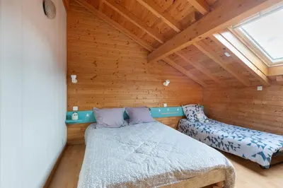 Un ou plusieurs lits dans un hébergement de l'établissement Kioné - duplex avec terrasse