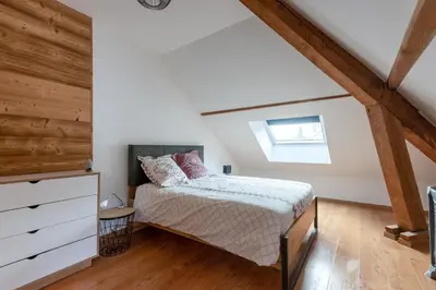 Un ou plusieurs lits dans un hébergement de l'établissement Ouréa - duplex avec balcon