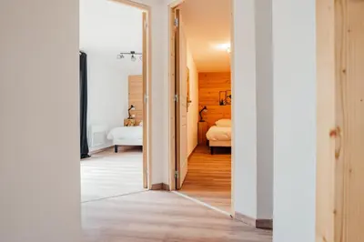 Un ou plusieurs lits dans un hébergement de l'établissement La maison du Xetté