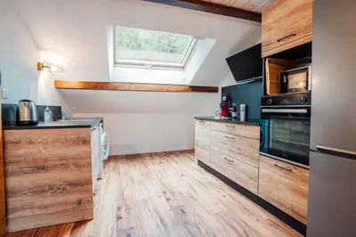 Cuisine ou kitchenette dans l'établissement La maison du Xetté