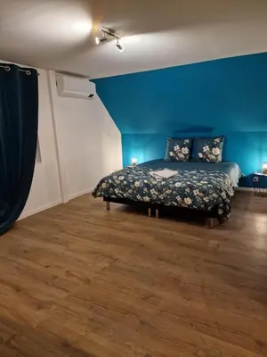 Un ou plusieurs lits dans un hébergement de l'établissement Gîte Chez Yann