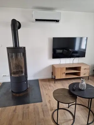 Télévision ou salle de divertissement dans l'établissement Gîte Chez Yann