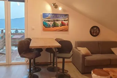 Coin salon dans l'établissement La Chouette-Appartement