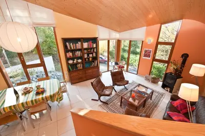 Coin salon dans l'établissement Gîte du Kiwi