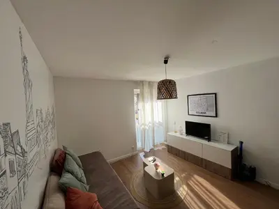Télévision ou salle de divertissement dans l'établissement En plein Centre de Colmar avec Parking