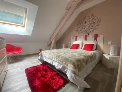 Un ou plusieurs lits dans un hébergement de l'établissement Le cosy de la vologne