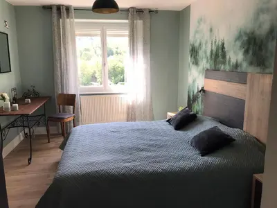 Un ou plusieurs lits dans un hébergement de l'établissement Gîte Monts et Merveilles