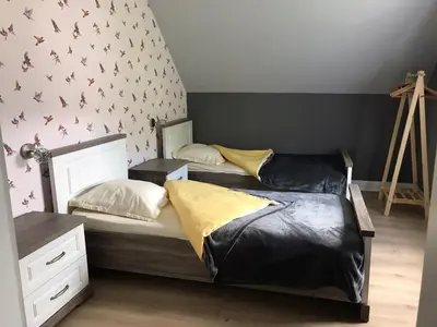 Un ou plusieurs lits dans un hébergement de l'établissement Gîte Monts et Merveilles