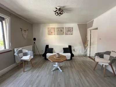 Coin salon dans l'établissement Gîte au Giessen - 1er étage