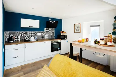 Cuisine ou kitchenette dans l'établissement Appartement Ezean belfort ville