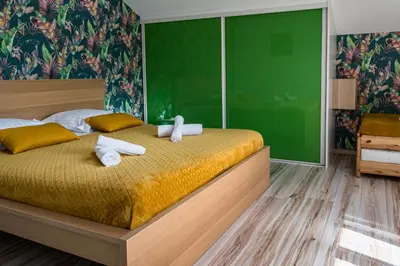 Un ou plusieurs lits dans un hébergement de l'établissement L'Écrin de Xattys - Gîte de luxe avec SPA et piscine privés, Terrain de pétanque, Baby-foot