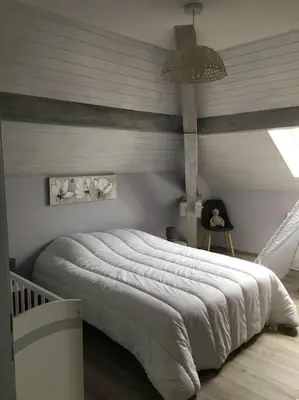 Un ou plusieurs lits dans un hébergement de l'établissement Loft avec jardin