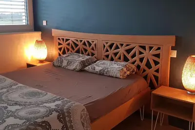 Un ou plusieurs lits dans un hébergement de l'établissement Maison Passive avec piscine proche Colmar