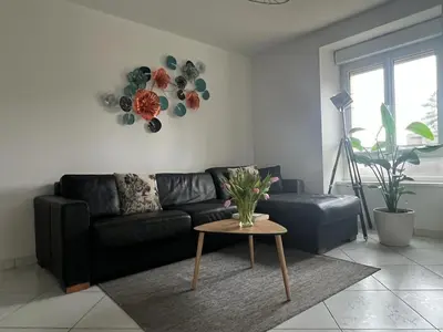 Coin salon dans l'établissement Gîte des hirondelles - Appartement de 75 m2
