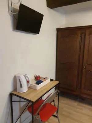 Télévision ou salle de divertissement dans l'établissement Studio GREEN