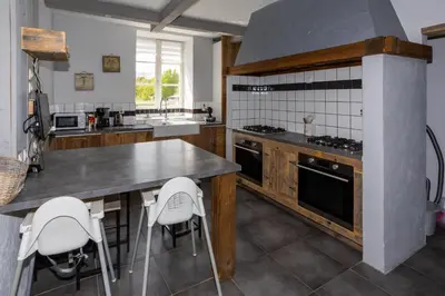 Cuisine ou kitchenette dans l'établissement Gîte 4 à 10 pers