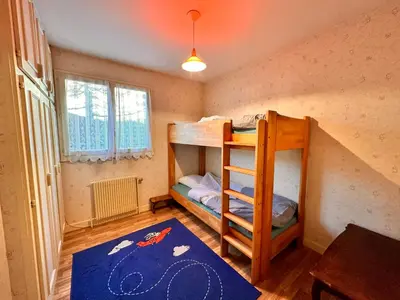 Un ou plusieurs lits dans un hébergement de l'établissement Gîte Le Pingu - spacieux, calme, plein sud - cabine sauna - 8 personnes