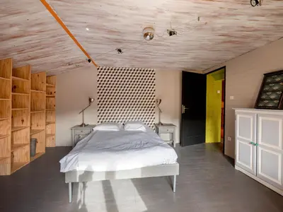 Un ou plusieurs lits dans un hébergement de l'établissement La Maison de Max - avec terrasse