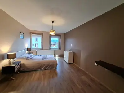 Un ou plusieurs lits dans un hébergement de l'établissement Appartement moderne et lumineux, proche de Saint-Dié-des-Vosges - 5 pers., WiFi, parking, terrasse - FR-1-589-434