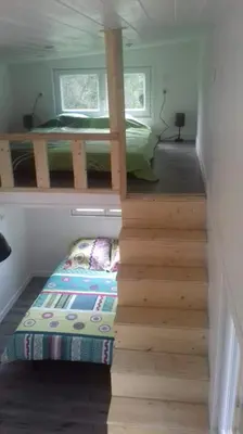 Un ou plusieurs lits dans un hébergement de l'établissement Tiny House JOY