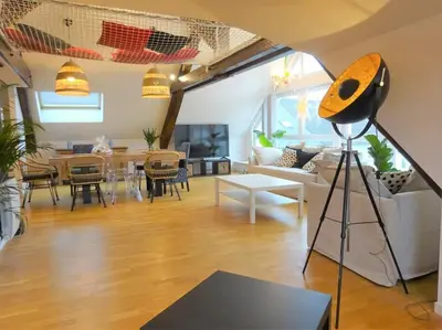Télévision ou salle de divertissement dans l'établissement Appartement Panoramique
