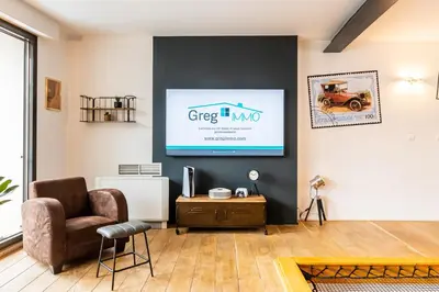 Coin salon dans l'établissement Le 48-GregIMMO-Appart'Hôtel