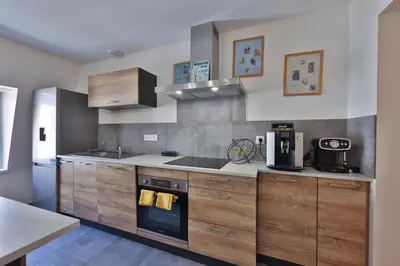 Cuisine ou kitchenette dans l'établissement COTE MONTAGNE