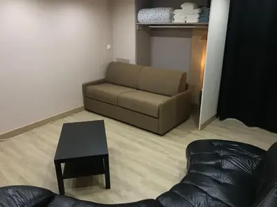 Coin salon dans l'établissement Paisible logement tout équipé pour 1 à 6 personnes