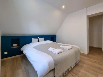 Un ou plusieurs lits dans un hébergement de l'établissement Travel Homes - NewGate 3, elegant, heart of Colmar