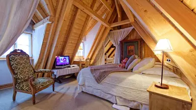 Télévision ou salle de divertissement dans l'établissement Le Colombier
