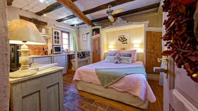 Un ou plusieurs lits dans un hébergement de l'établissement Remparts de Riquewihr - Refuge du Lutin - Studio